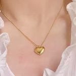 gladde ketting met hartjes bedel